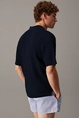 CALVIN KLEIN OPEN KNIT POLO